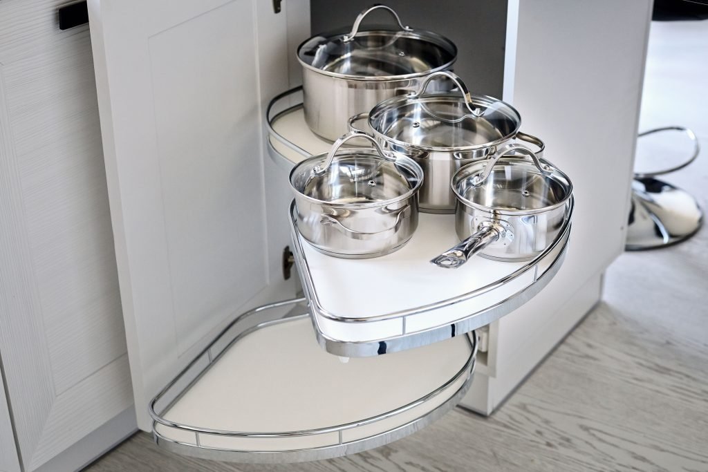 Space saving kitchen hacks - use of lazy susans for your pois and pans
